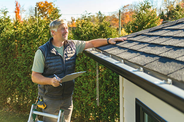 Professional Roofing technician working in Greeley, IA